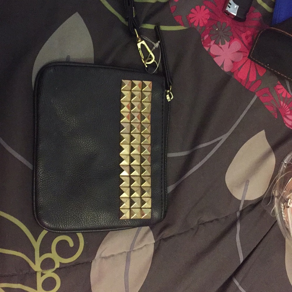 Black mini clutch with gold spikes